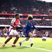 Marc Cucurella of Chelsea is tackled by Jurrien Timber of Arsenal during the Premier League match between Arsenal FC and Chelsea FC at Emirates Stadium on March 16, 2025 in London, England. 