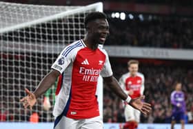 Bukayo Saka celebrates scoring against Fulham.