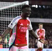 Bukayo Saka celebrates scoring against Fulham.