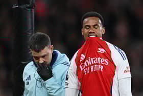Gabriel of Arsenal looks dejected as he leaves the pitch after picking up an injury during the Premier League match between Arsenal FC and Fulham FC at Emirates Stadium on April 01, 2025 in London, England. 