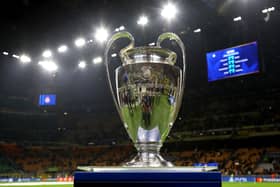 The UEFA Champions League trophy is displayed on a plinth at the side of the pitch prior to the UEFA Champions League 2024/25 UEFA Champions League 2024/25 Round of 16 Second Leg match between FC Internazionale Milano and Feyenoord at Stadio San Siro on March 11, 2025 in Milan, Italy.