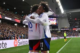 Ainsley Maitland-Niles and Rayan Cherki of Lyon