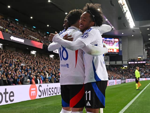 Ainsley Maitland-Niles and Rayan Cherki of Lyon