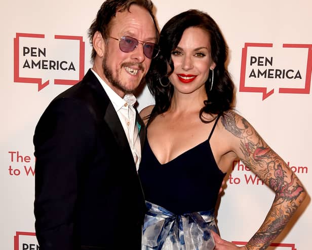 The wife of Weezer bassist Scott Shriner has been booked for attempted murder after an altercation with Los Angeles police on Monday afternoon.
