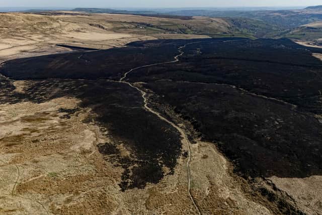 Aerial views show the aftermath after three blazes broke out on land near March Haigh Reservoir in Marsden.