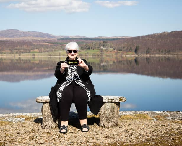 Patricia Moule,  Omaze Winner outside her new £4m home in Scotland.