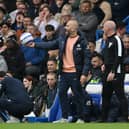 Enzo Maresca, Manager of Chelsea, reacts with the ball during the Premier League match between Chelsea FC and Ipswich Town FC at Stamford Bridge on April 13, 2025 in London, England.