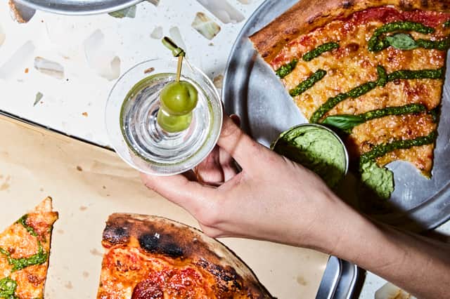 A slice of pizza and a martini would hit the spot 