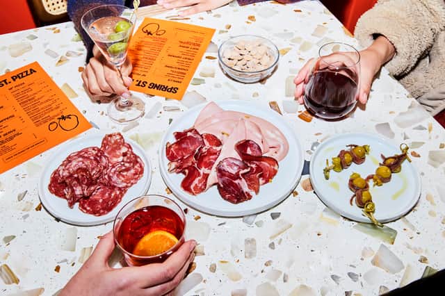 Dine on charcuterie and cocktails at Spring Street Pizza 