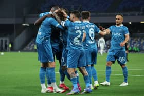 Scott McTominay celebrates scoring for Napoli.