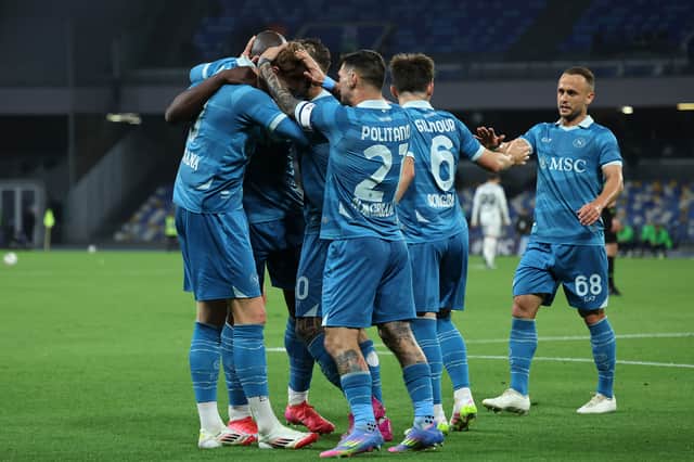 Scott McTominay celebrates scoring for Napoli.