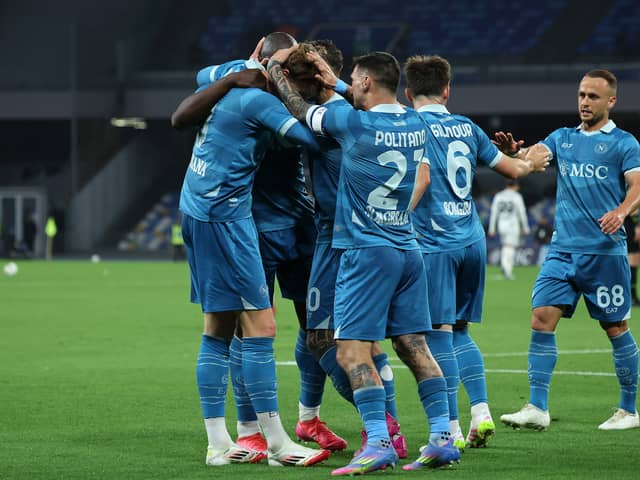 Scott McTominay celebrates scoring for Napoli.
