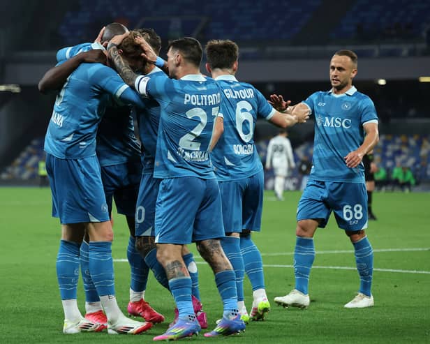 Scott McTominay celebrates scoring for Napoli.