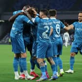 Scott McTominay celebrates scoring for Napoli.