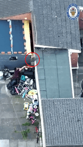 Drug dealer lobs bin bag of heroin over fence during police raid