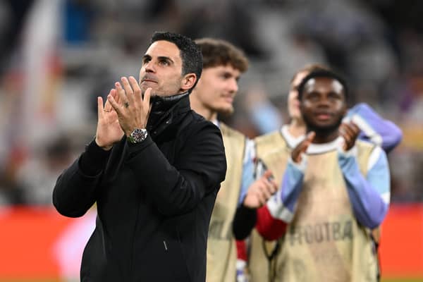 Mikel Arteta, Manager of Arsenal, applauds the fans at the end of the UEFA Champions League 2024/25 Quarter Final Second Leg match between Real Madrid C.F. and Arsenal FC at Estadio Santiago Bernabeu on April 16, 2025 in Madrid, Spain.