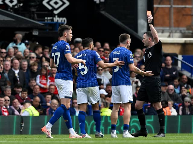Leif Davis was shown a red card against Arsenal.