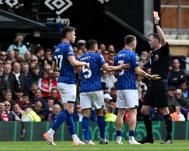 Leif Davis was shown a red card against Arsenal.