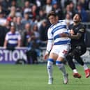 Harrison Ashby of QPR battles Ronald of Swansea City.
