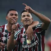 Esquerdinha celebrates with Fluminense teammate Kaua Elias.