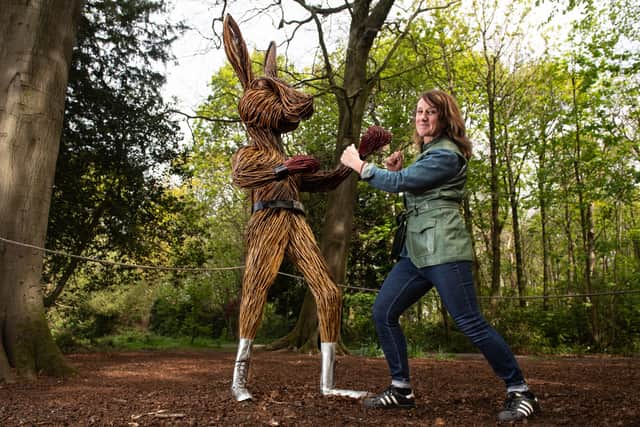Helena Mellenchip, willow sculpture artist with one of her 'boxing hares' on display at Lytham Hall.