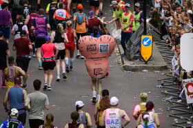 Brave runner takes on London Marathon dressed as a giant testicle 
