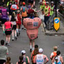 Brave runner takes on London Marathon dressed as a giant testicle 