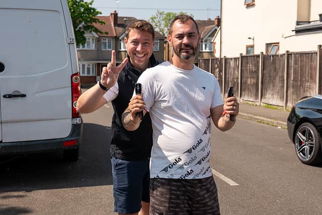 BOTB presenter Christian Williams, left, hands over the keys to his namesake Christian Dorobantu