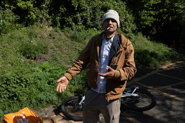 Zia Mahan, an Afghan national and Just Eat delivery cyclist, has been sleeping rough in the car park for the past two or three months