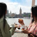 Soak up the city's skyline with the O2's afternoon tea pod 