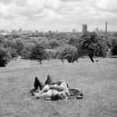A couple cuddles on Primrose Hill in London (2006) 