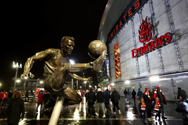 The statue of Dennis Bergkamp, former Arsenal player is seen outside the Emirates stadium