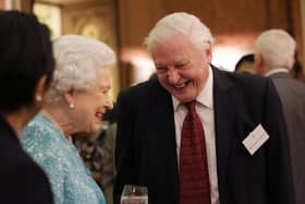 Queen Elizabeth II and Sir David  Attenborough attend a reception to showcase forestry projects that have been dedicated to the new conservation initiative The Queen's Commonwealth Canopy (QCC) at Buckingham Palace on November 15, 2016 in London