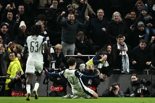 Mikey Moore celebrates scoring for Tottenham in the Champions League.