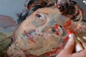 A portrait drawn with makeup by Margit van der Zwan.