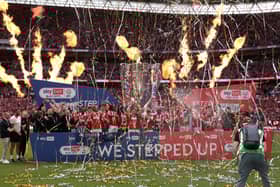 Charlton Athletic celebrate promotion to the Championship.