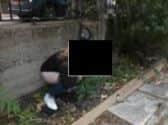 An alleged GoBoat customer defecating in a garden