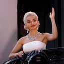 Members of the public watch Rachel Zegler perform "Don't Cry For Me Argentina" live on the balcony as she plays Eva Peron in "Evita" at the London Palladium