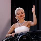 Members of the public watch Rachel Zegler perform "Don't Cry For Me Argentina" live on the balcony as she plays Eva Peron in "Evita" at the London Palladium