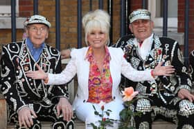 Barbara Windsor poses alongside the Pearly Kings in 2012