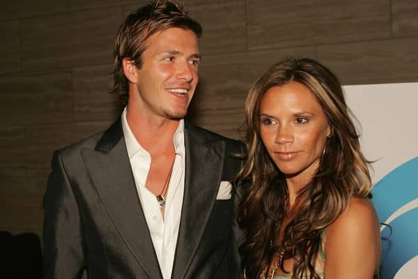 England and Real Madrid football player David Beckham and wife Victoria pose at "The David Beckham Academy" launch party at Creative Artists Agency on June 3, 2005 in Beverly Hills