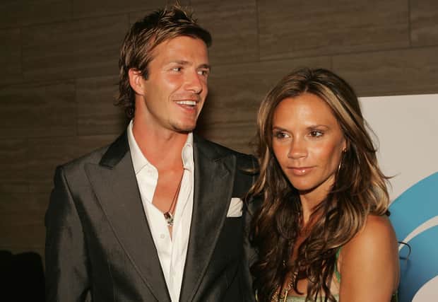 England and Real Madrid football player David Beckham and wife Victoria pose at "The David Beckham Academy" launch party at Creative Artists Agency on June 3, 2005 in Beverly Hills