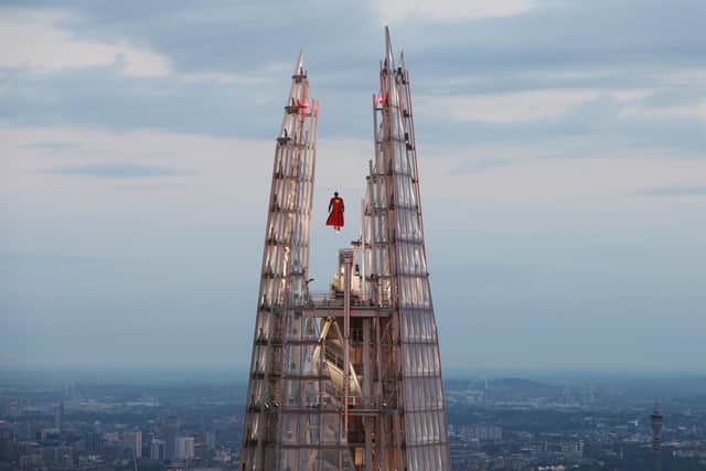The 11ft sculpture of the iconic superhero based on star David Corenswet is suspended within the 1,000ft high exposed spire of the UK's tallest building