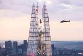 “Is it a bird… is it a plane…? London Looks Up as a hyper-realistic sculpture of Superman is displayed over 300 metres above the city, hovering between the spires of The Shard.