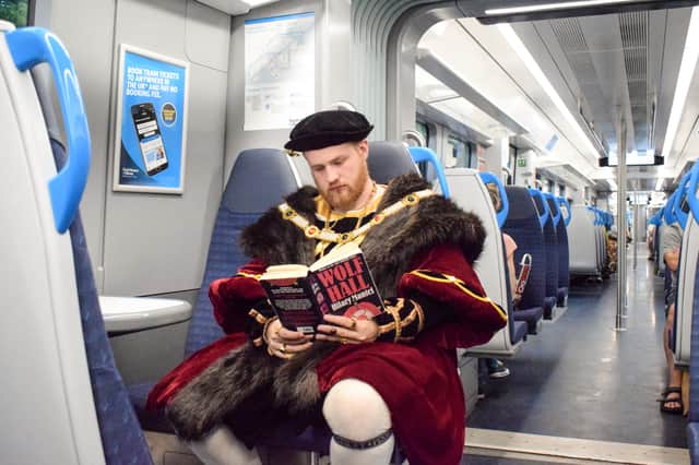 Henry VIII spotted reading a copy of Wolf Hall on the SWR train