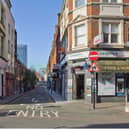 Image taken from the townscape and visual impact assessment shows the view down Fashion Street from Brick Lane, with a green dotted outline of the proposed tower above Liverpool Street Station