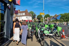 Lime bike parking filled up much of the pavement around Southfields station, with bikes being hemmed in from the road with barriers
