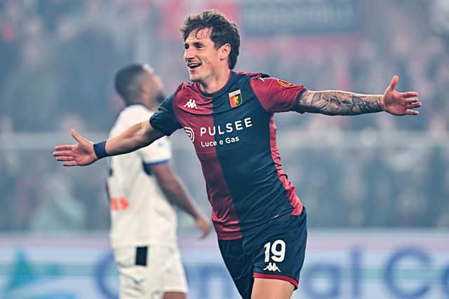 Pinamonti celebrates scoring for Genoa.