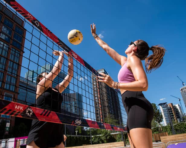You can now play beach volleyball in the middle of Canary Wharf