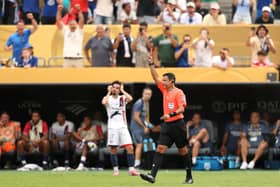 Joao Neves is shown a red card in the Club World Cup final.